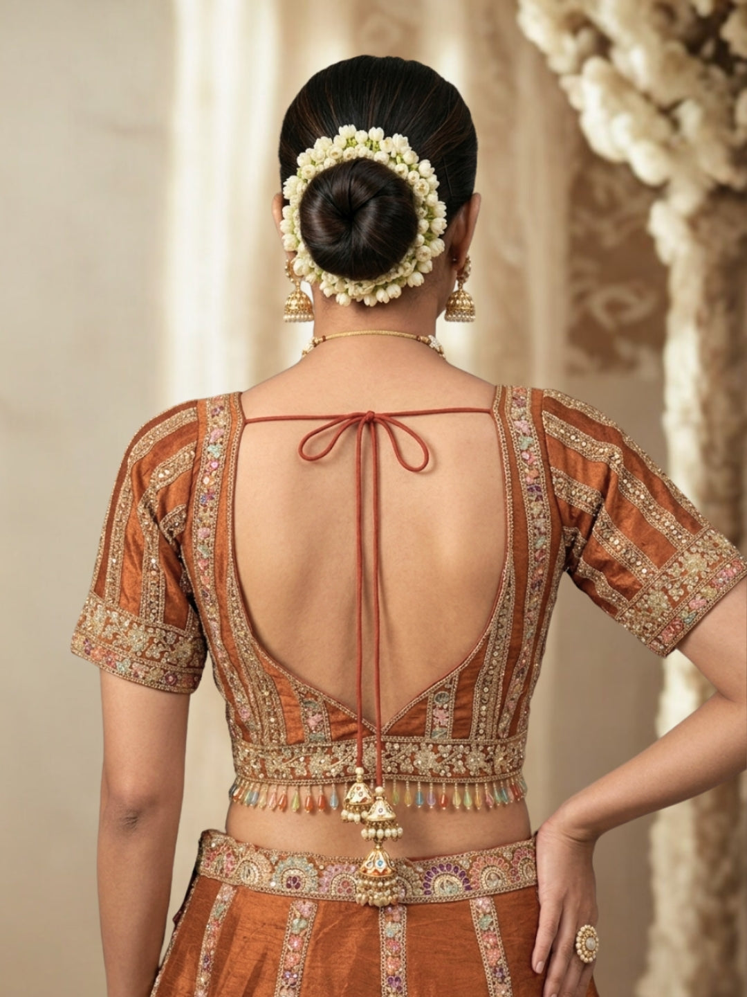 Rust Brown Crepe Lehenga Choli with Heavy Resham & Zari Embroidered Blouse, Tassel Hem & Embroidered Border