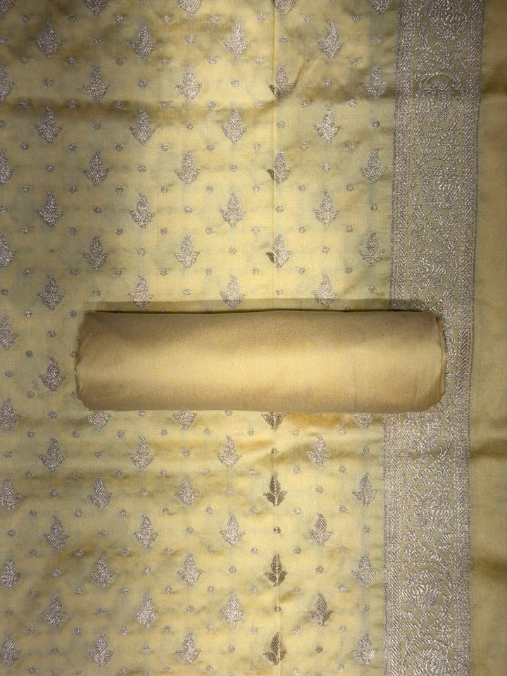 Lemon Yellow Zari Woven Banarasi Silk Dress Material with Floral Motif Jhalar dupatta
