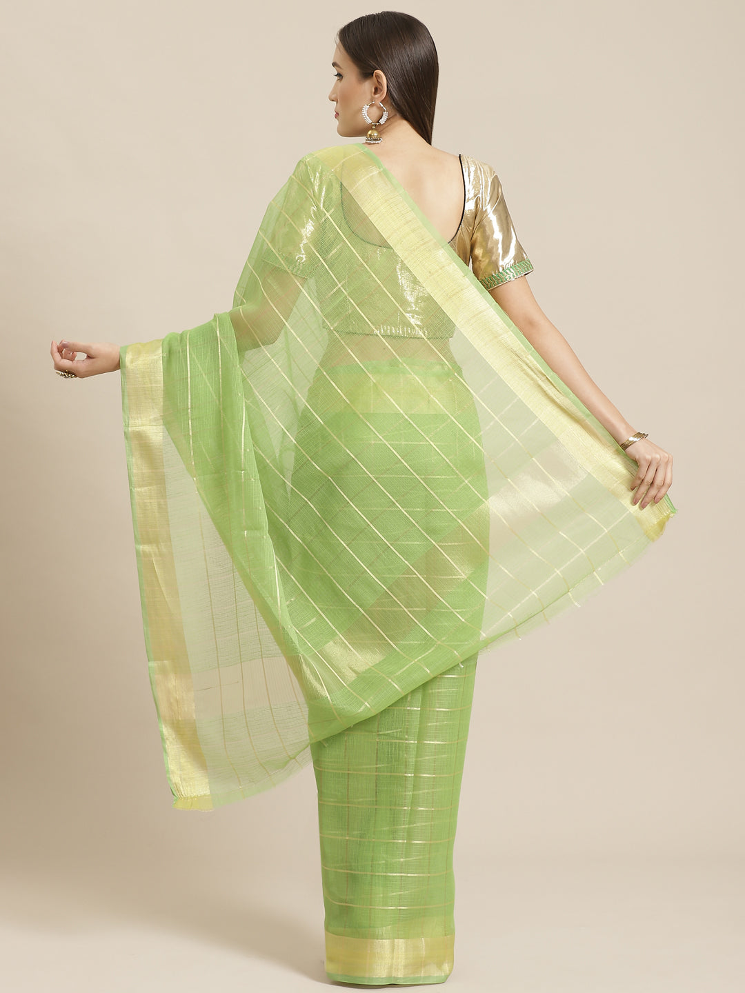 Green Chanderi Silk Kota saree with intricate Zari weaving in a striped pattern Saree