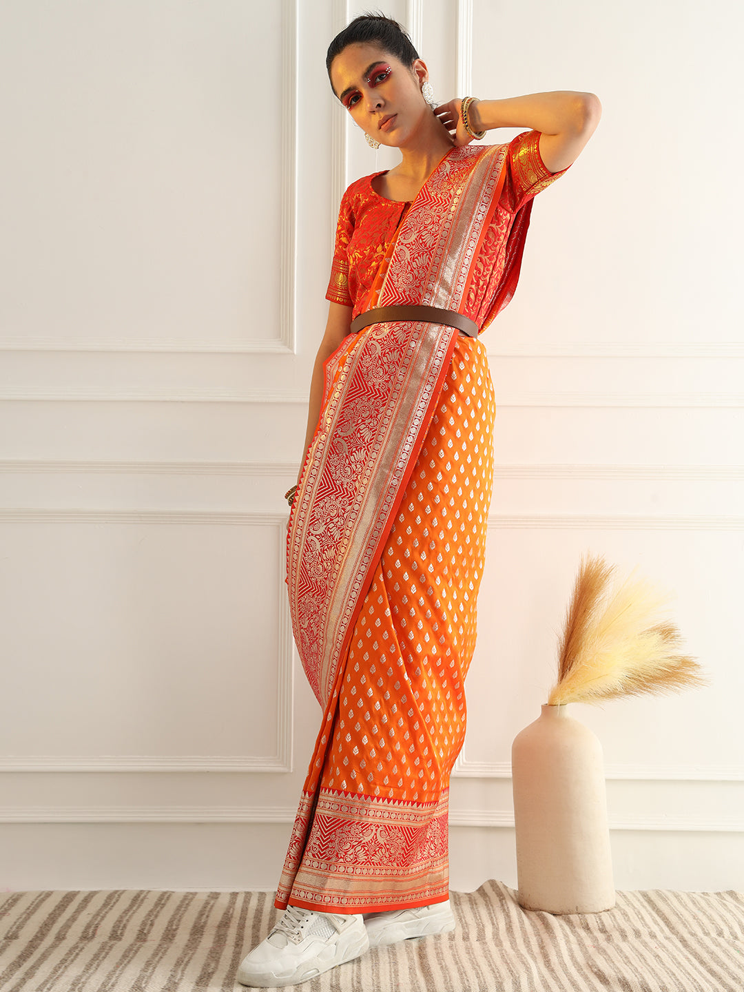Orange Zari Woven Banarasi Saree with Contrast Peacock Motif Border