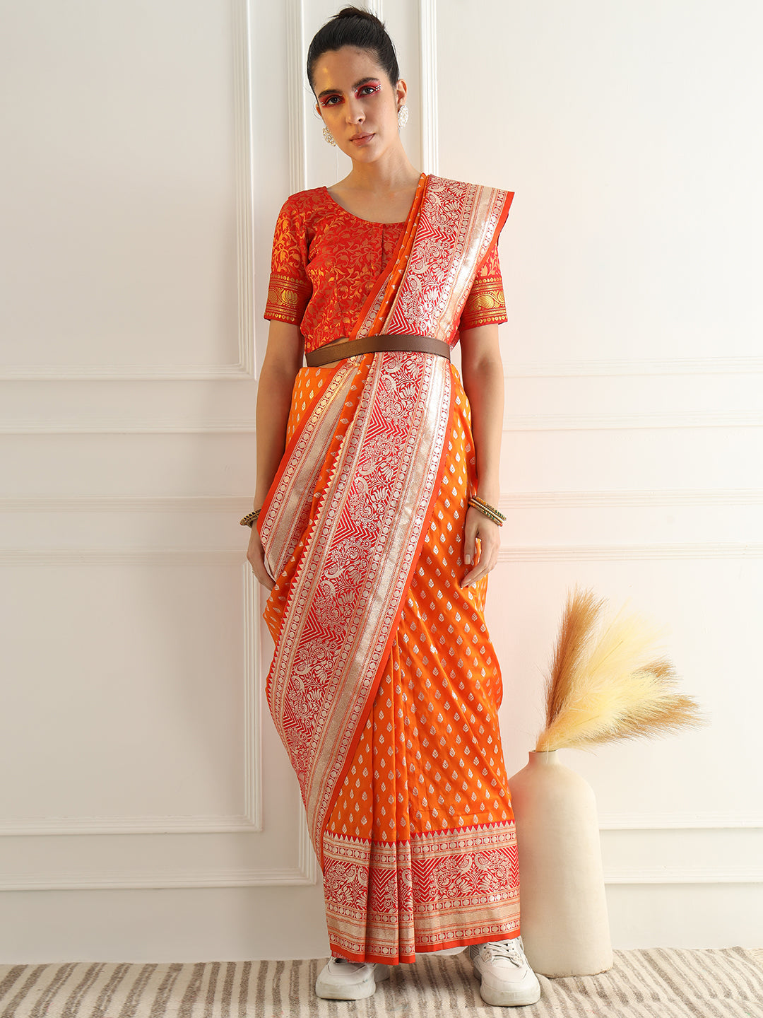 Orange Zari Woven Banarasi Saree with Contrast Peacock Motif Border