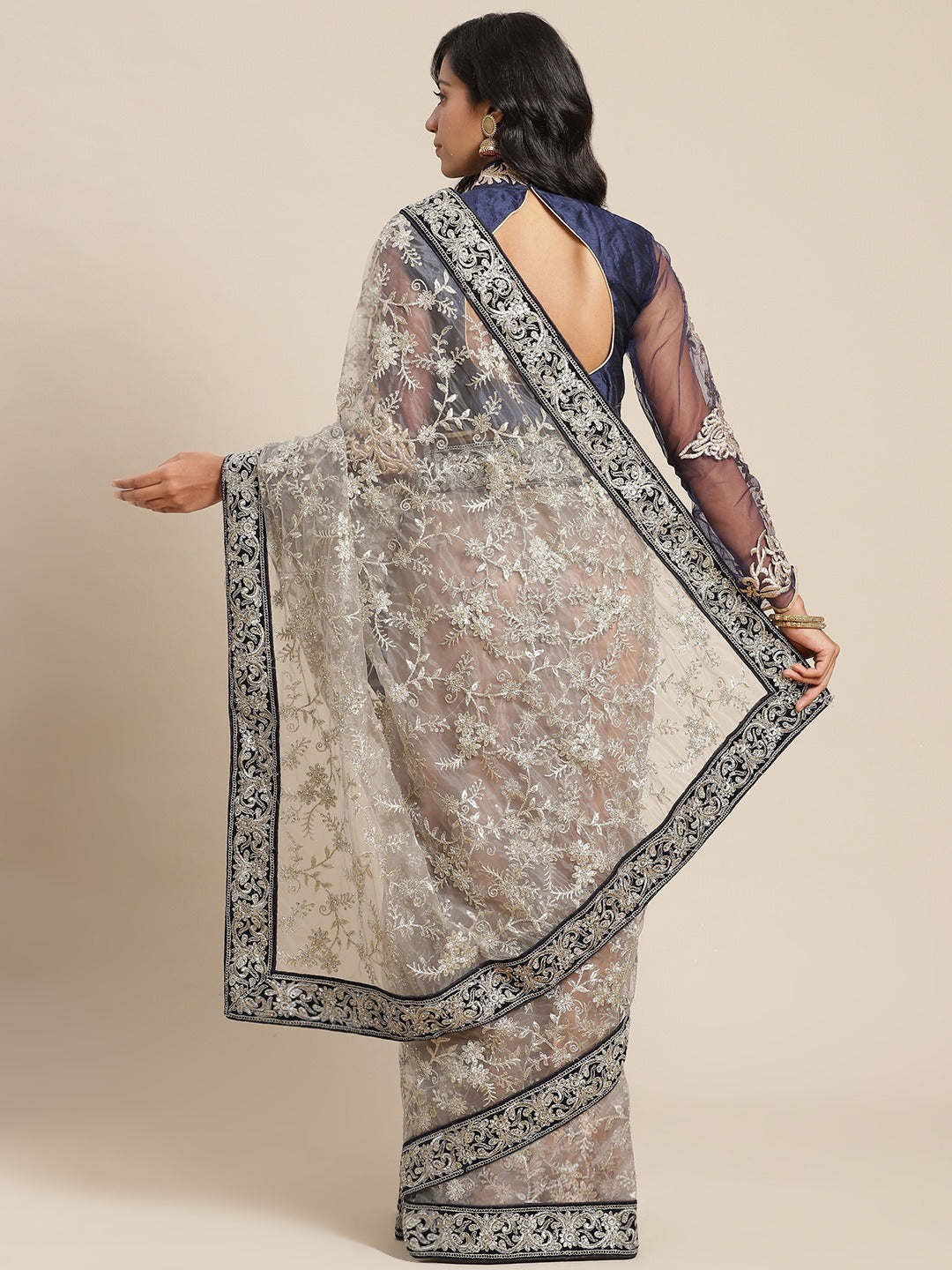 Chandni Grey Net Saree Embellished with Silver Zari and Crystals and Navy Velvet Border