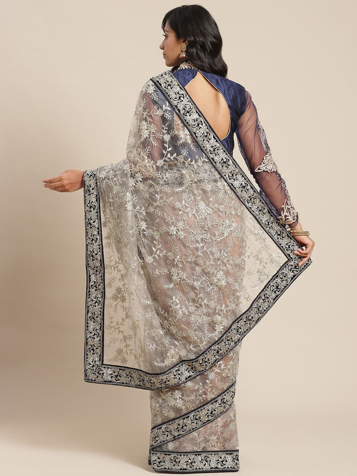 Chandni Grey Net Saree Embellished with Silver Zari and Crystals and Navy Velvet Border