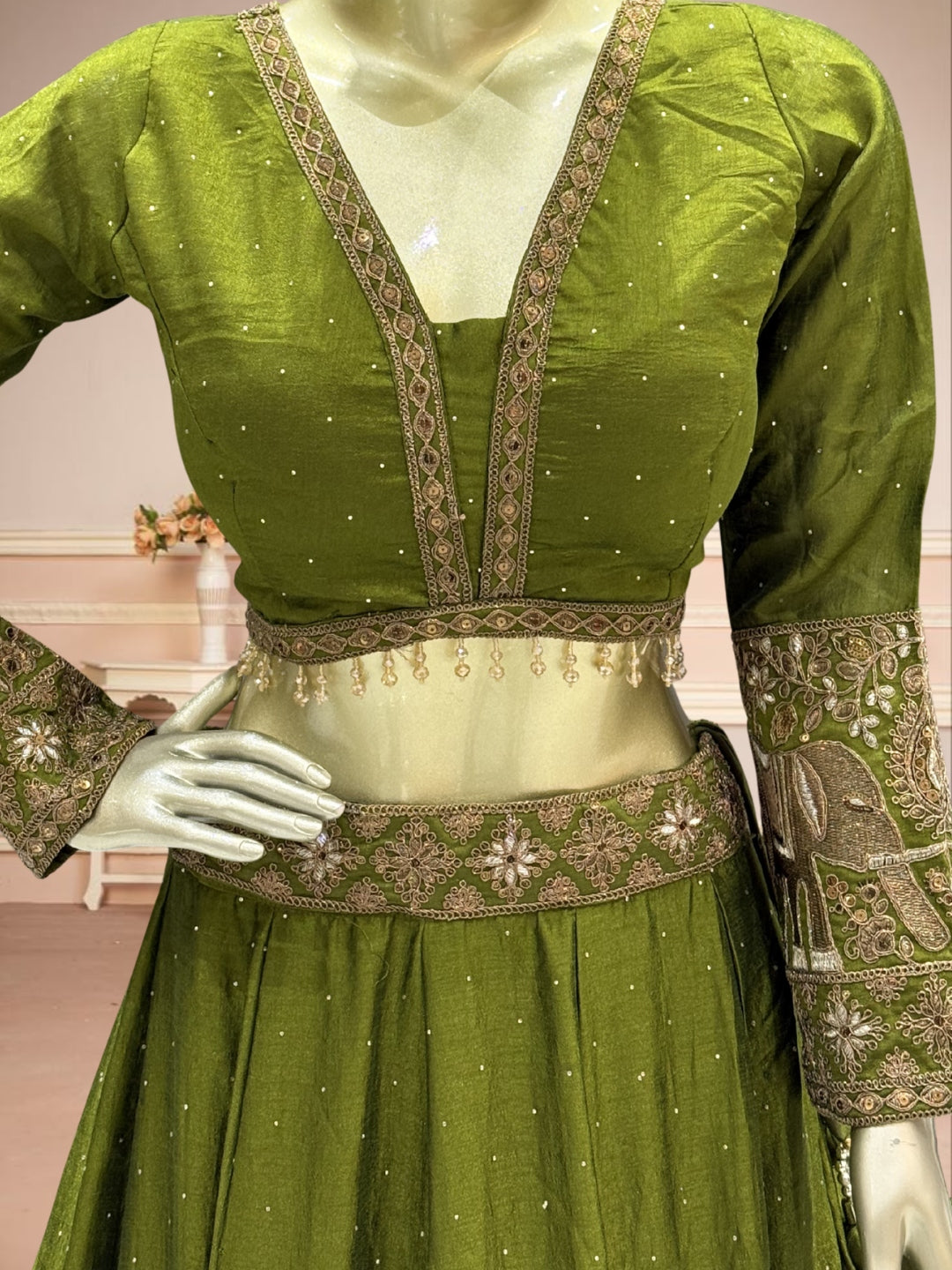 Mehendi Green Crepe Lehenga Choli with Antique Zari Elephant Motif Border & Sequin Work