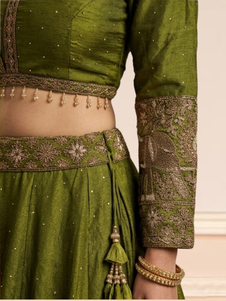 Mehendi Green Crepe Lehenga Choli with Antique Zari Elephant Motif Border & Sequin Work