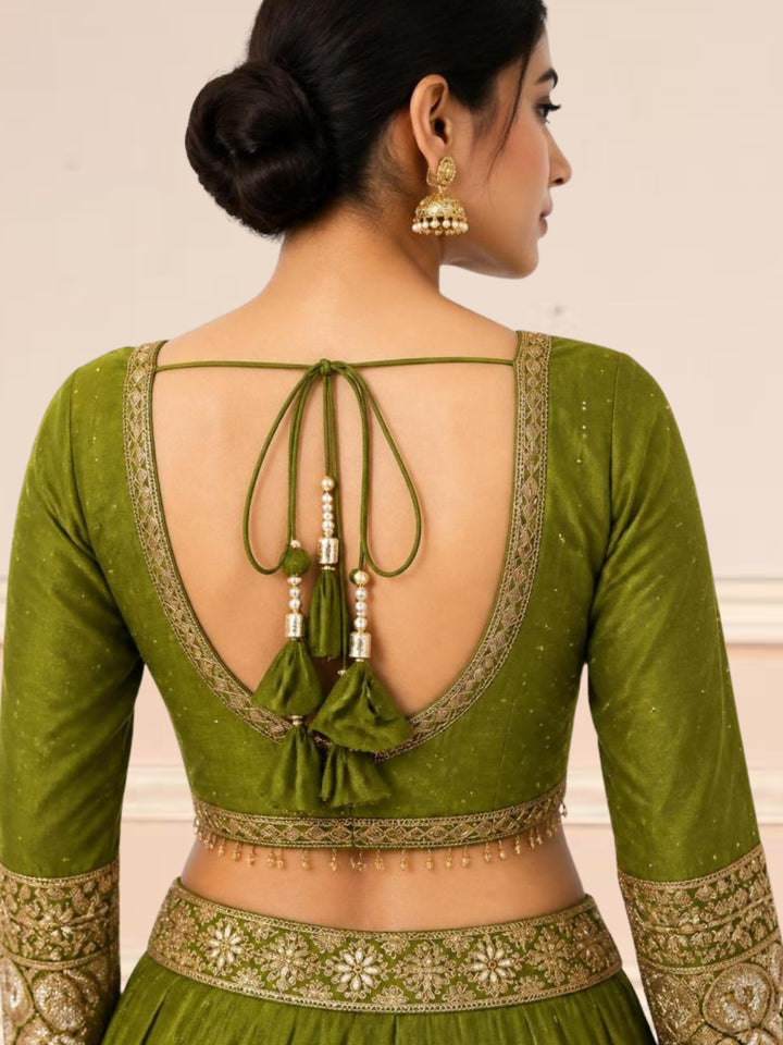 Mehendi Green Crepe Lehenga Choli with Antique Zari Elephant Motif Border & Sequin Work