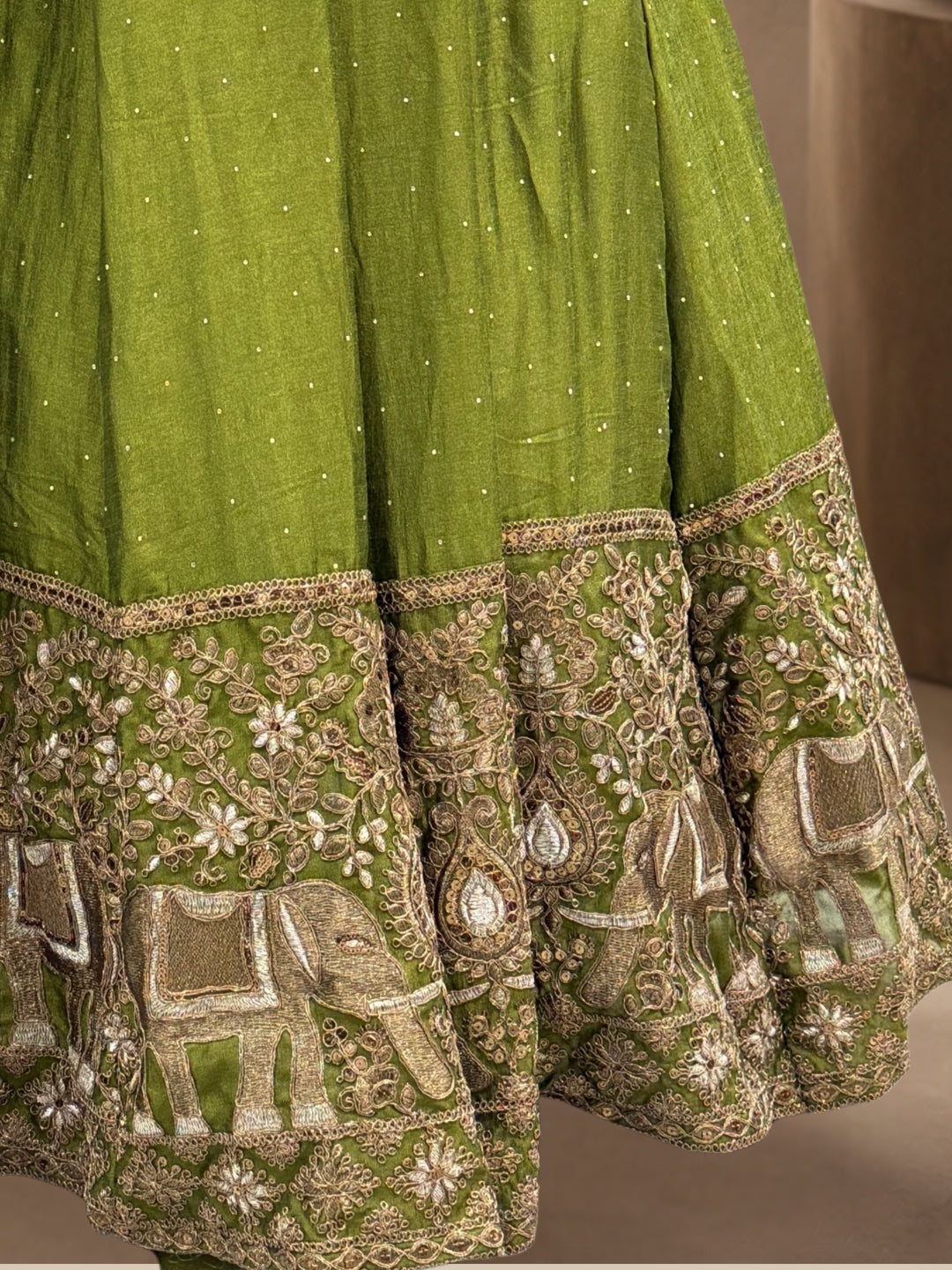 Mehendi Green Crepe Lehenga Choli with Antique Zari Elephant Motif Border & Sequin Work