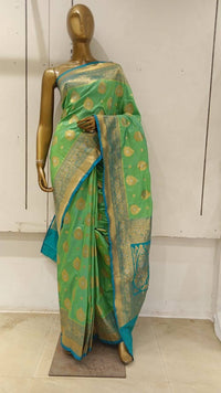 Chhabra 555 Sea Green Banarasi Silk Traditional Saree Embellished With Contrast Pallu & Border