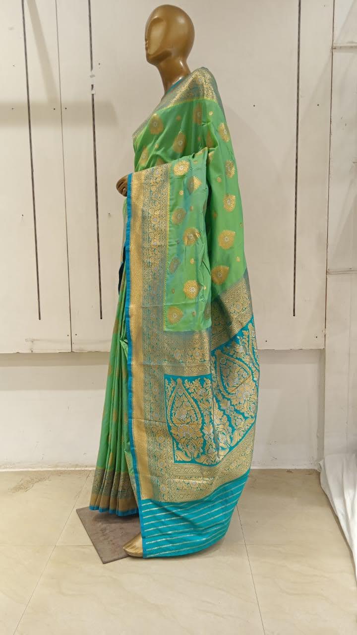 Chhabra 555 Sea Green Banarasi Silk Traditional Saree Embellished With Contrast Pallu & Border