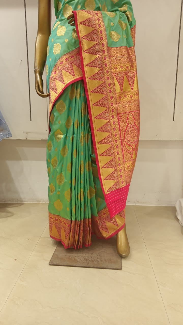 Chhabra 555 Green & Pink Zari Embellished Silk Blend Saree With Contrast Border & Pallu
