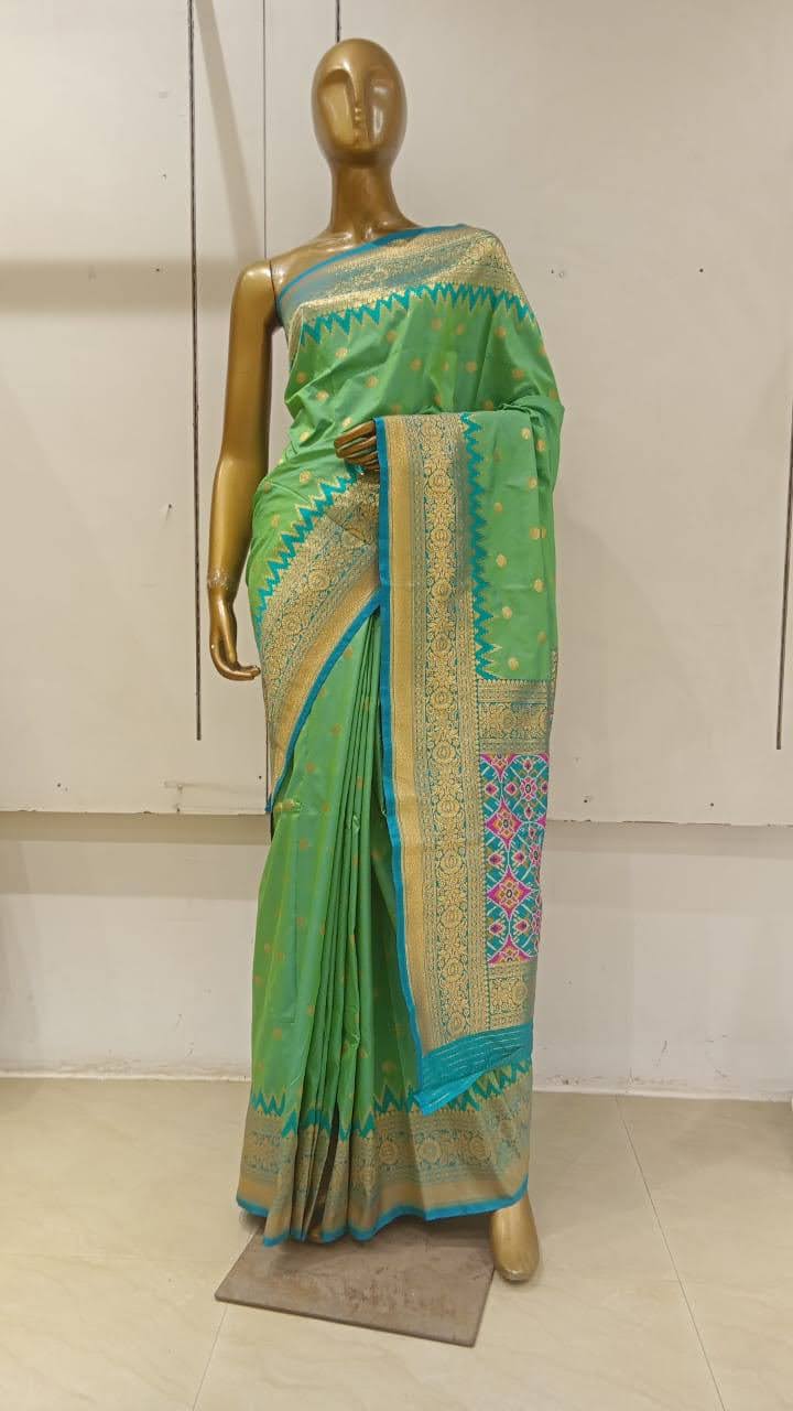 Chhabra 555 Green Banarasi Silk Blend Ethnic Saree Embellished With Bold Border