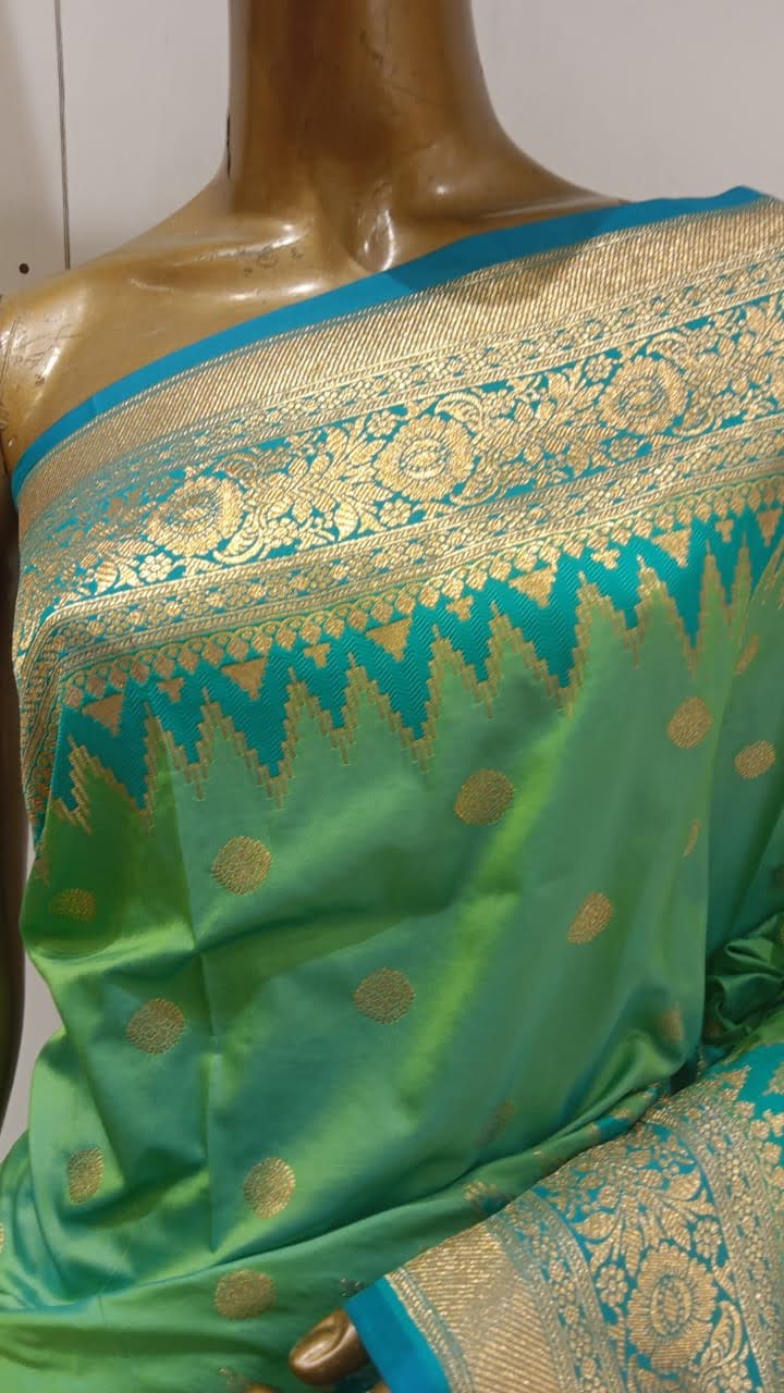 Chhabra 555 Green Banarasi Silk Blend Ethnic Saree Embellished With Bold Border