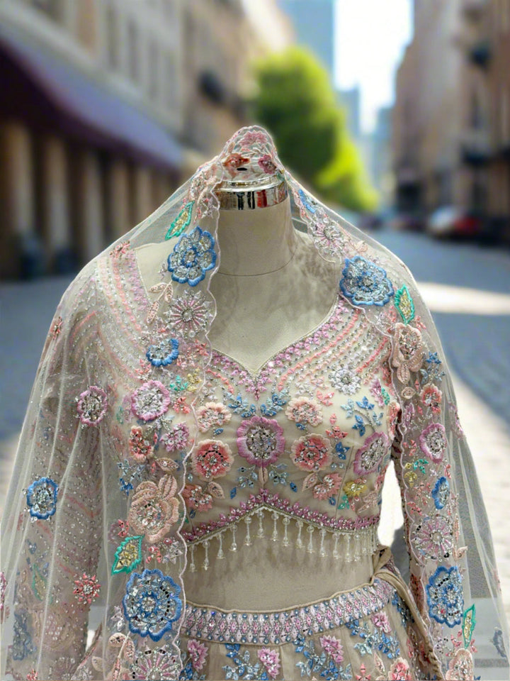 Cream Floral Embroidered Net Lehenga