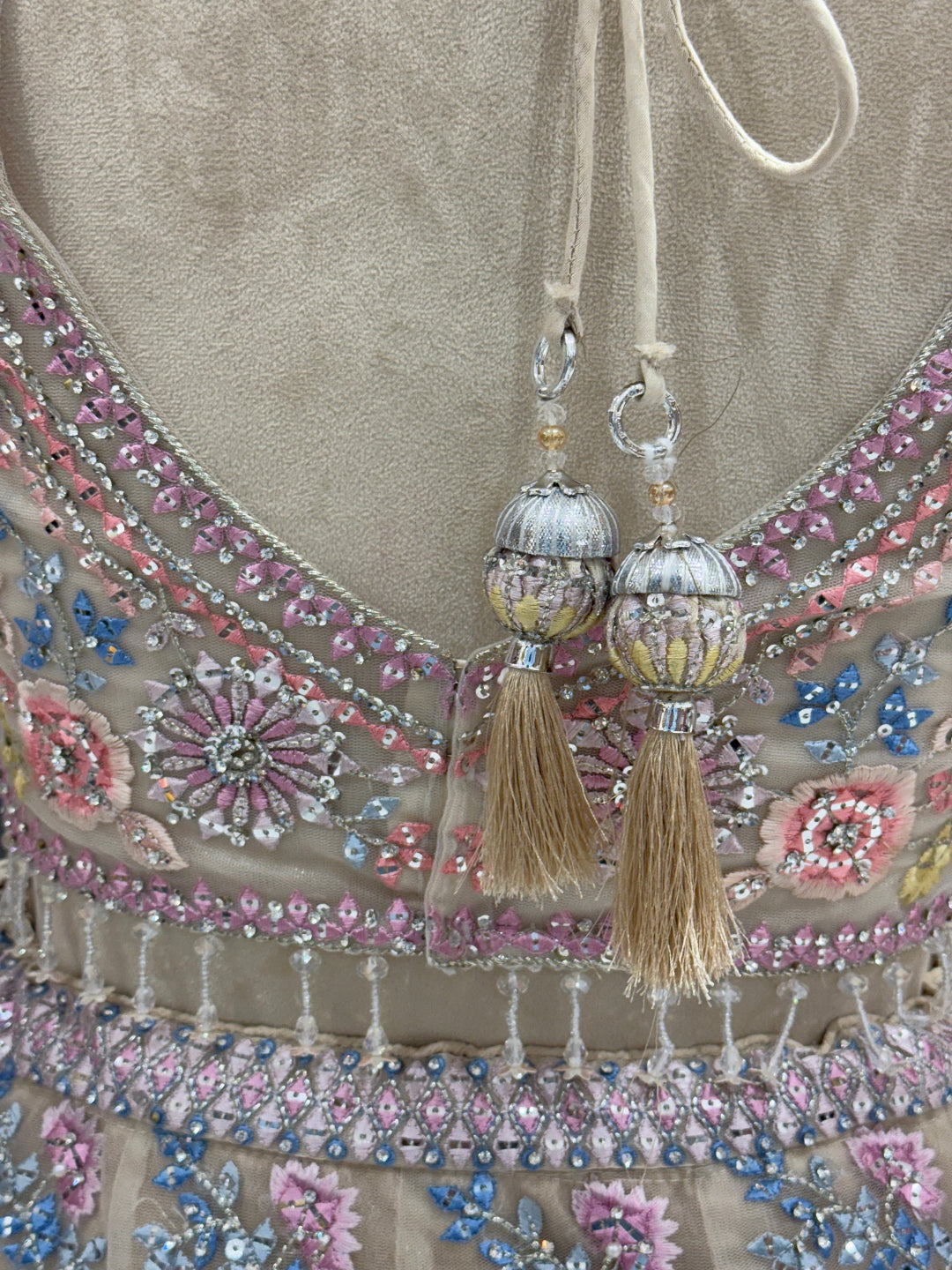 Cream Floral Embroidered Net Lehenga