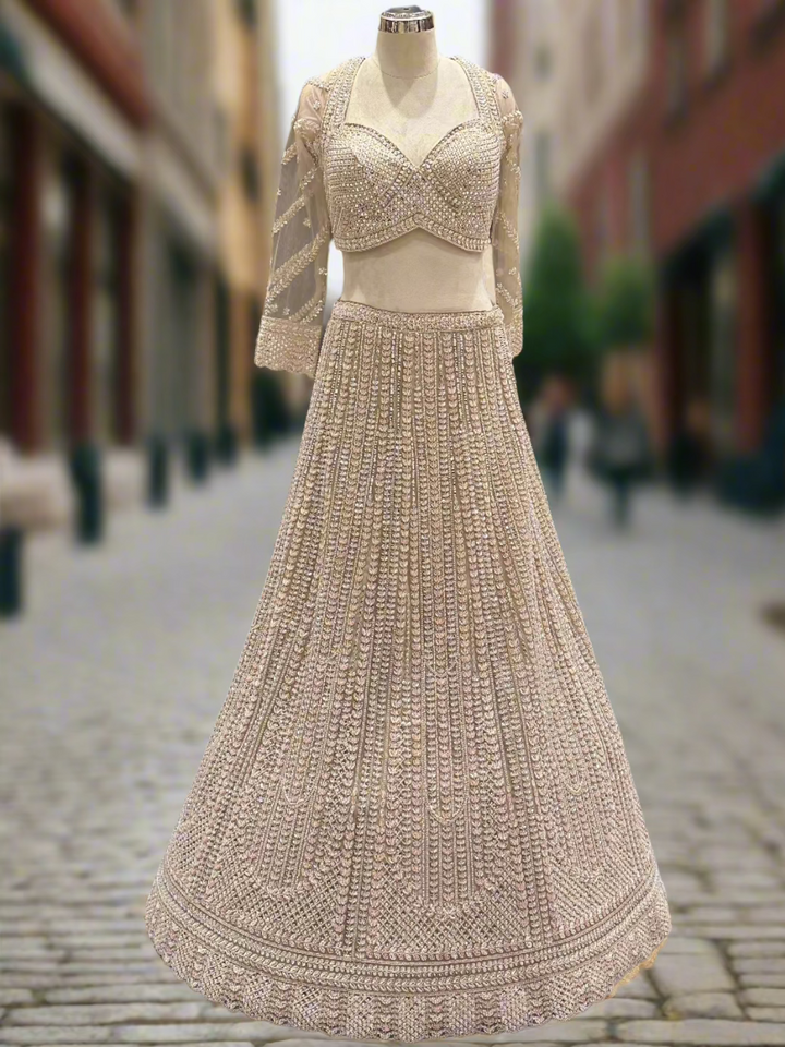 Exquisite Ivory Net Readymade Lehenga