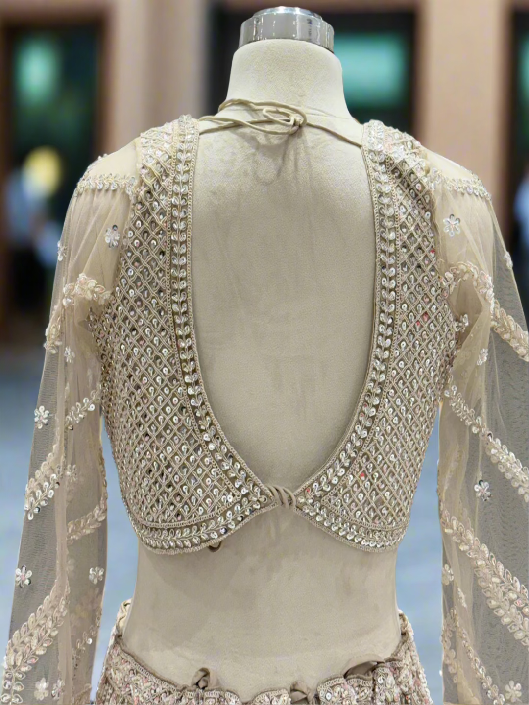 Exquisite Ivory Net Readymade Lehenga