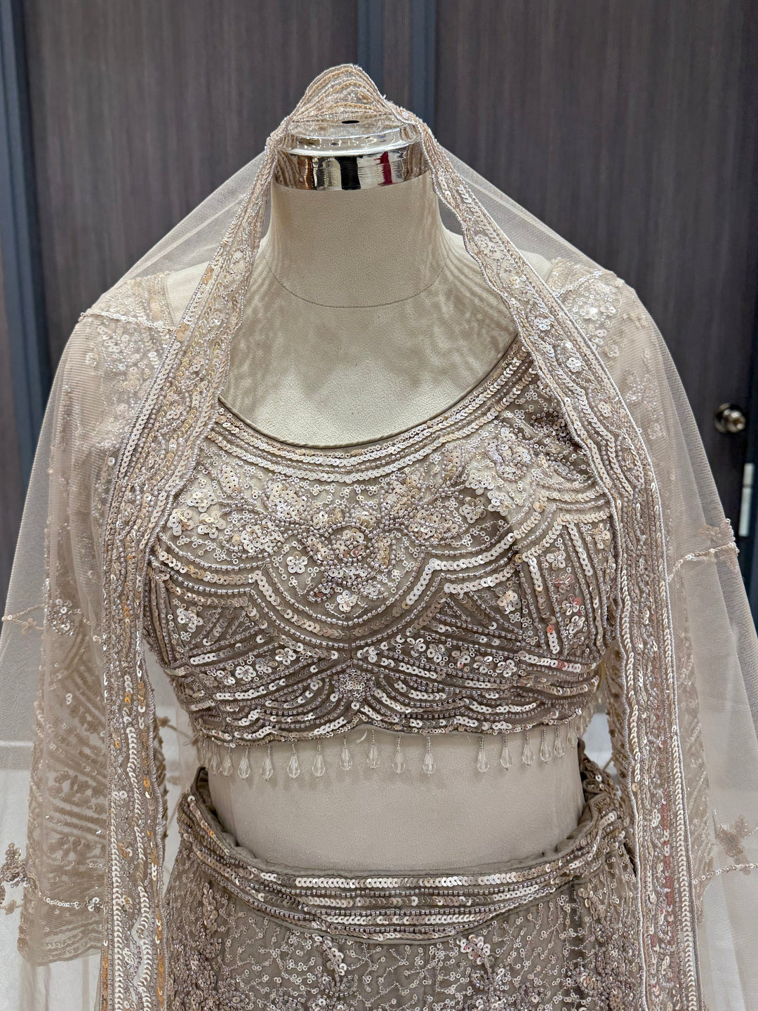 Exquisite Taupe Net Lehenga