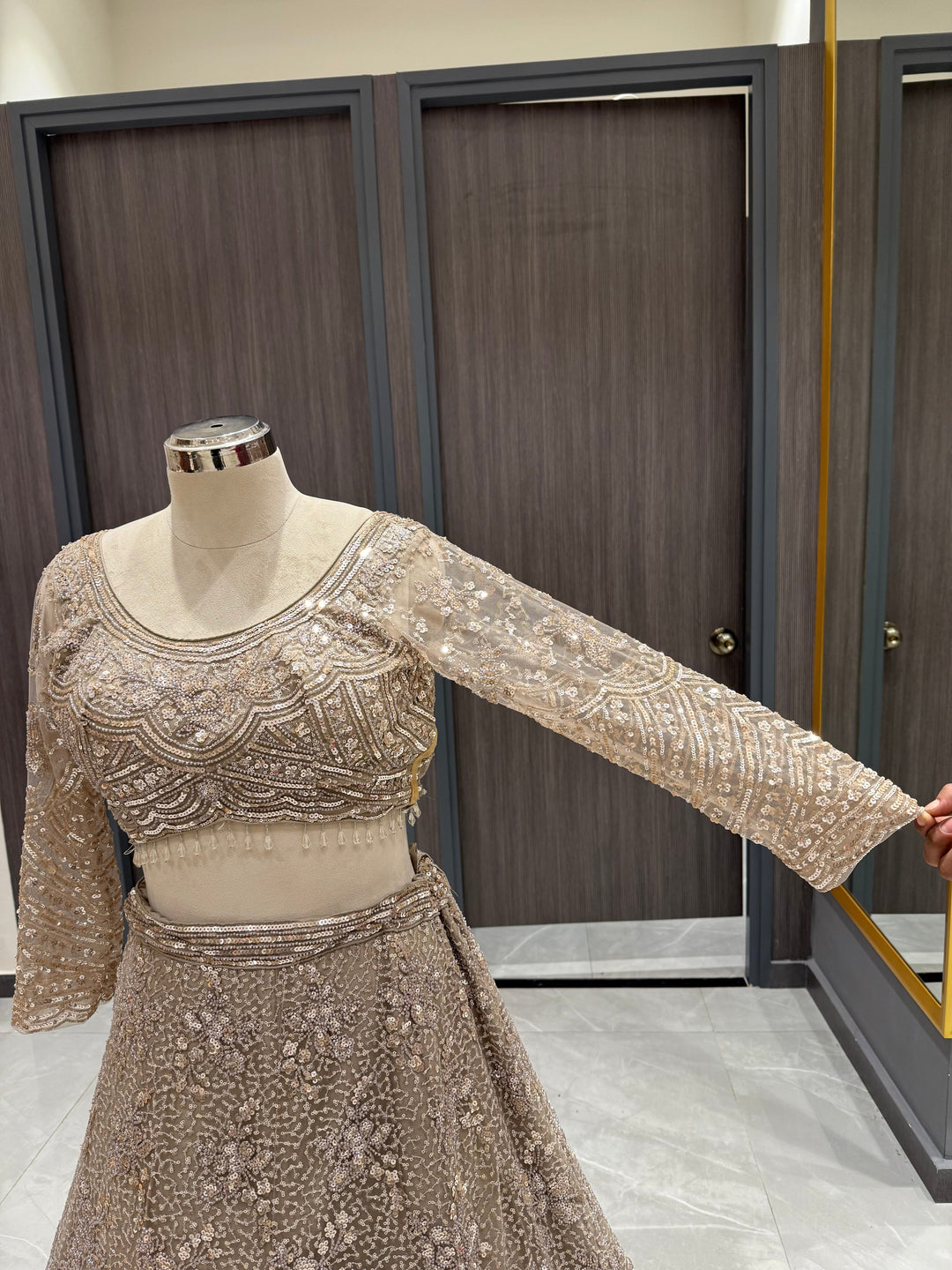 Exquisite Taupe Net Lehenga
