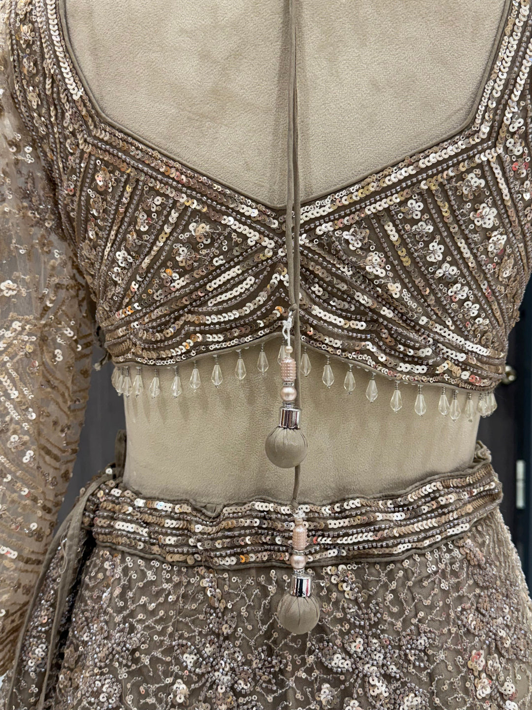 Exquisite Taupe Net Lehenga