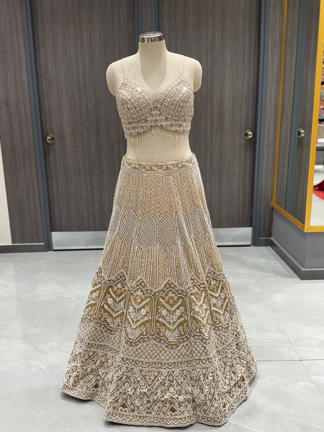 Luxurious Beige Net Lehenga