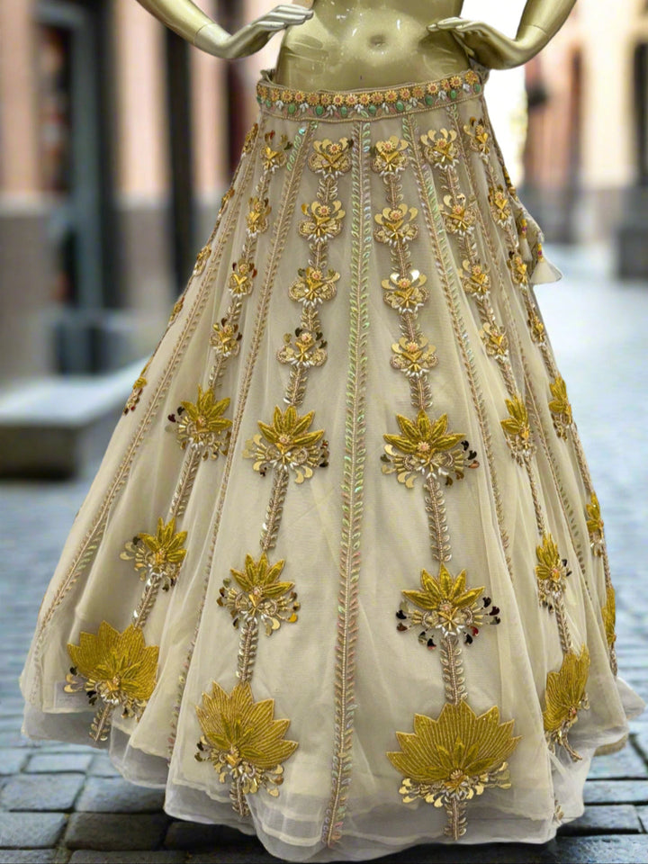 Golden and Ivory Embroidered Net Lehenga Set