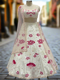 Ivory and Pink Embroidered Net Lehenga Set