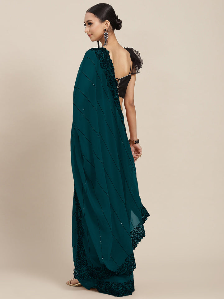 Bright Teal Blue Georgette Saree With Scalloped Border