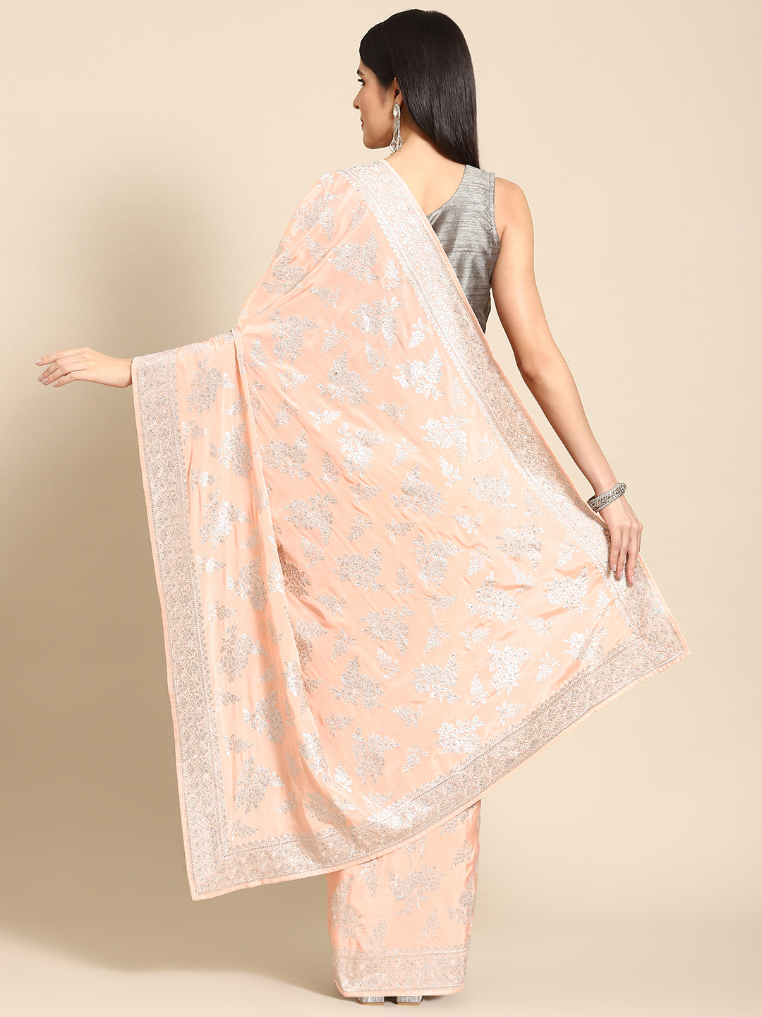 Peach Crepe Silver Embroidery & Stone Embellished Glamourous Saree