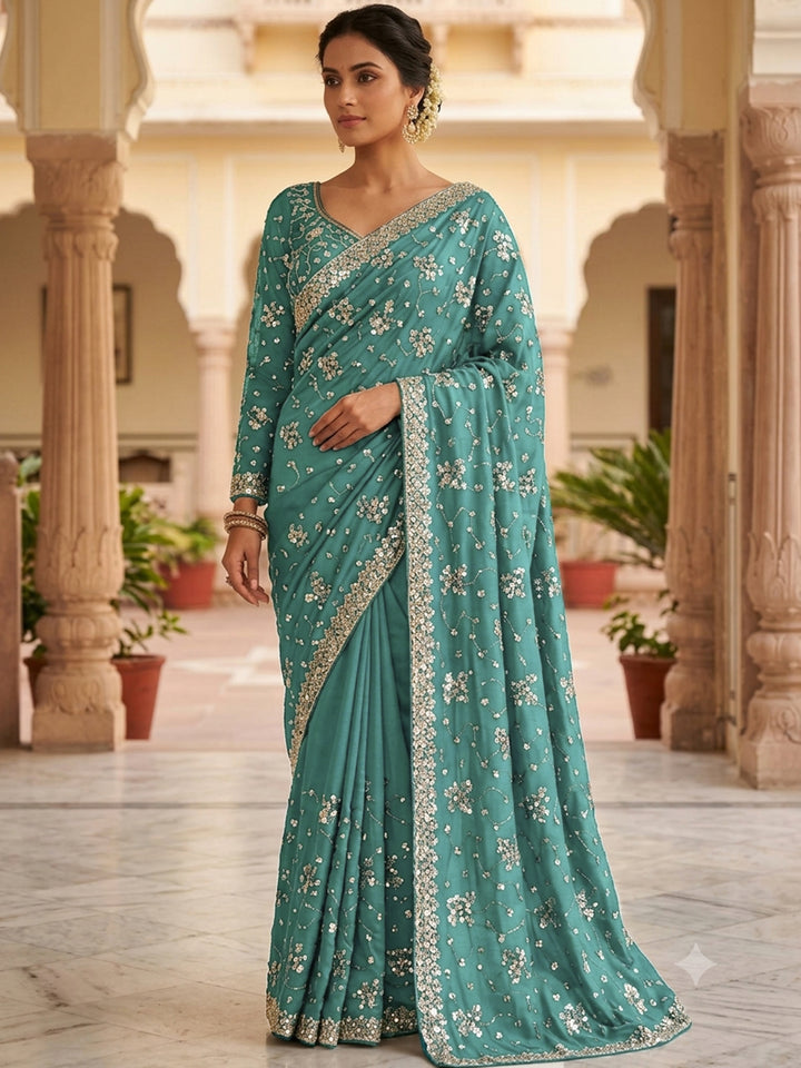 Teal blue Sequin Embroidered Georgette Saree with Stitched Blouse