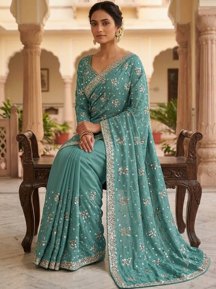 Teal blue Sequin Embroidered Georgette Saree with Stitched Blouse