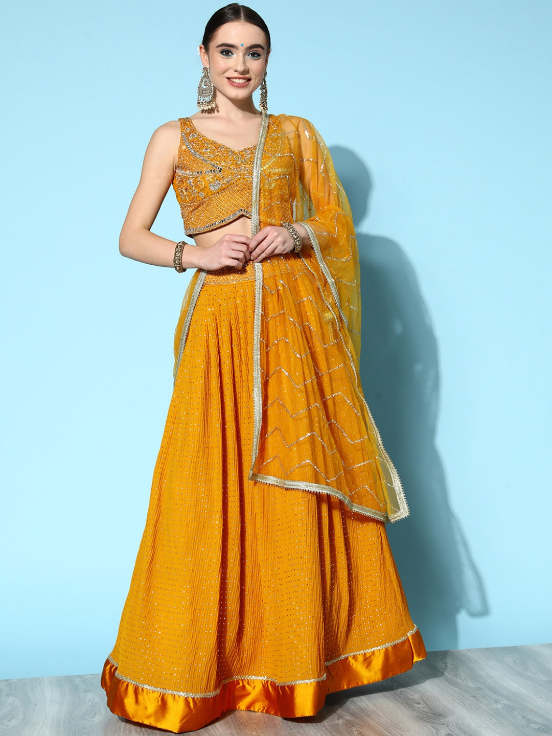 Mustard Mukaish Work Embellished Georgette Lehenga & Heavy Choli