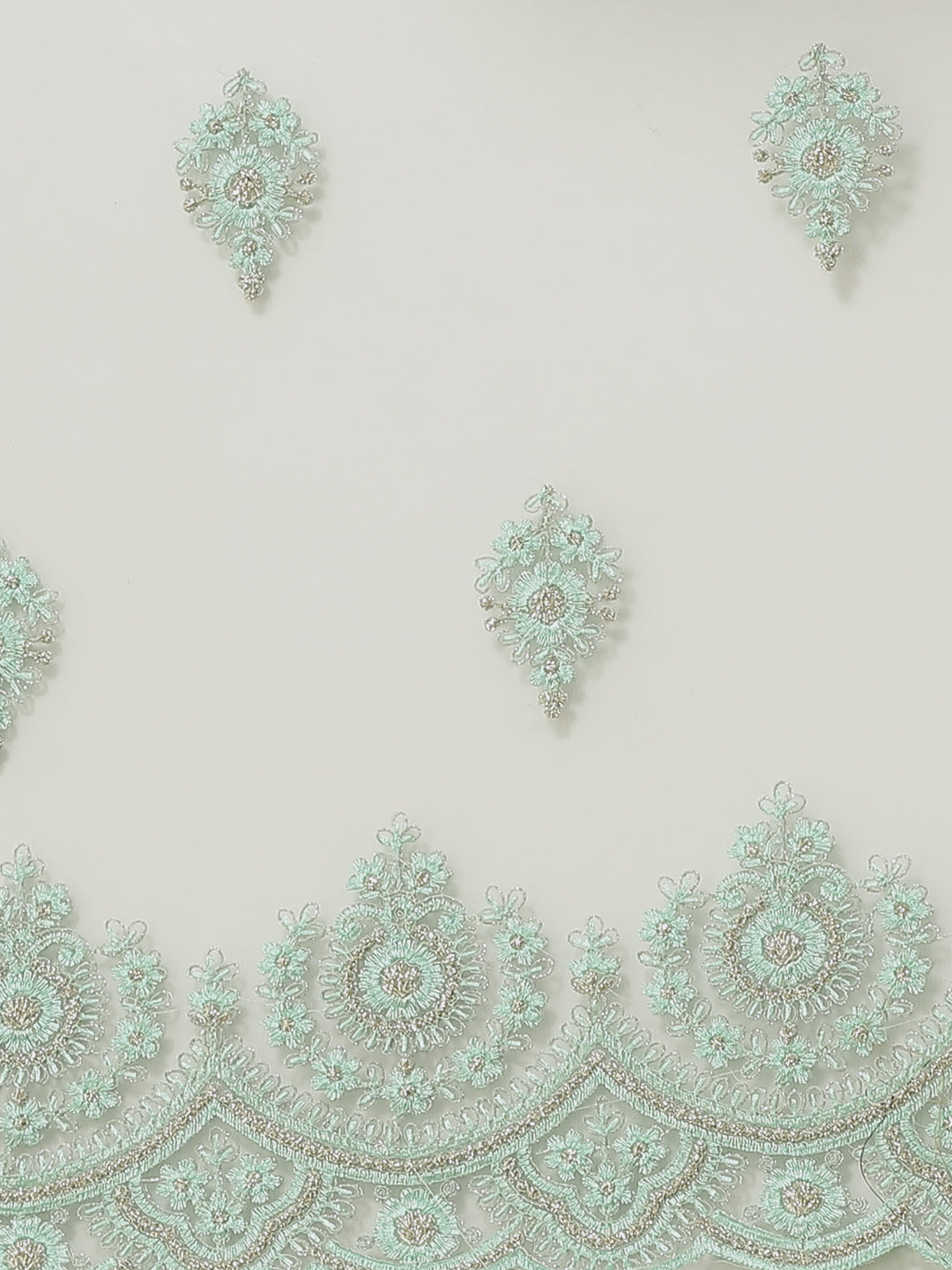 Sea Green Frills & Ruffles Net Saree with Heavy Silver Zari & Resham Embroidery