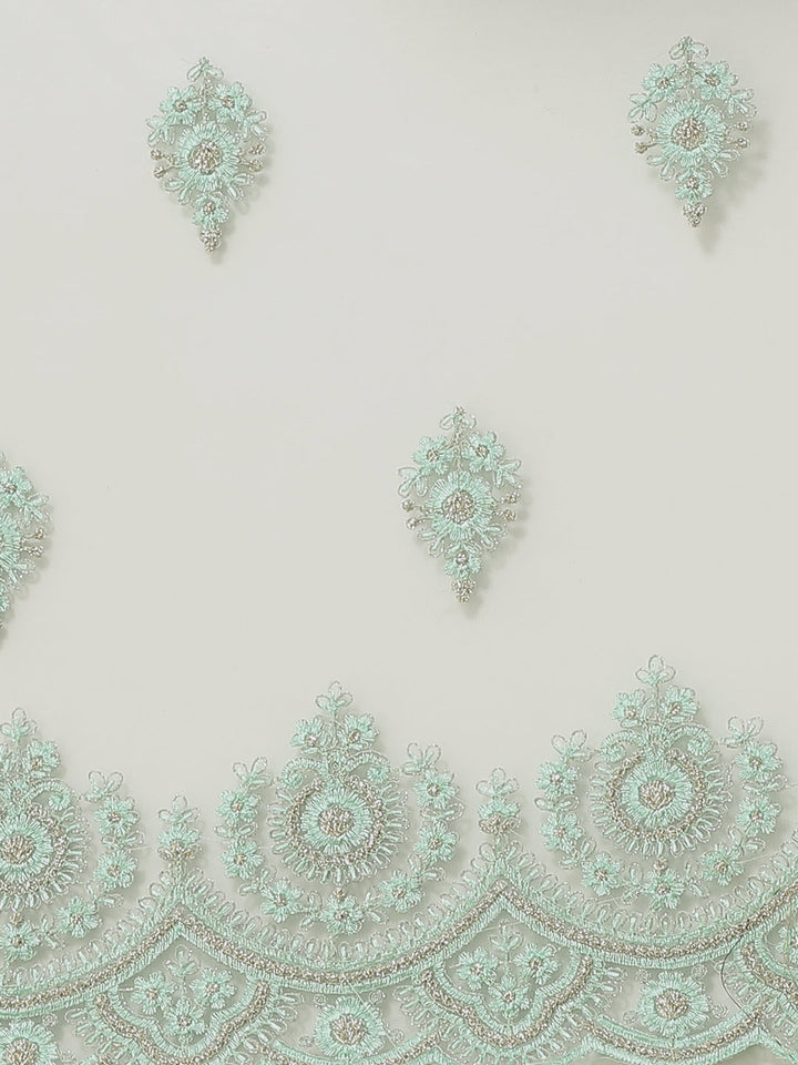 Sea Green Frills & Ruffles Net Saree with Heavy Silver Zari & Resham Embroidery