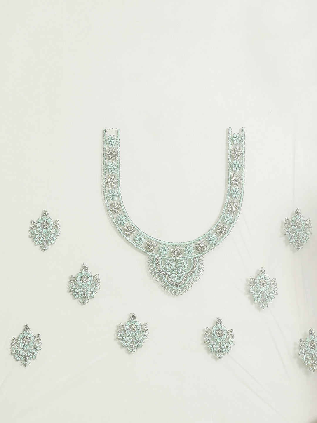 Sea Green Frills & Ruffles Net Saree with Heavy Silver Zari & Resham Embroidery