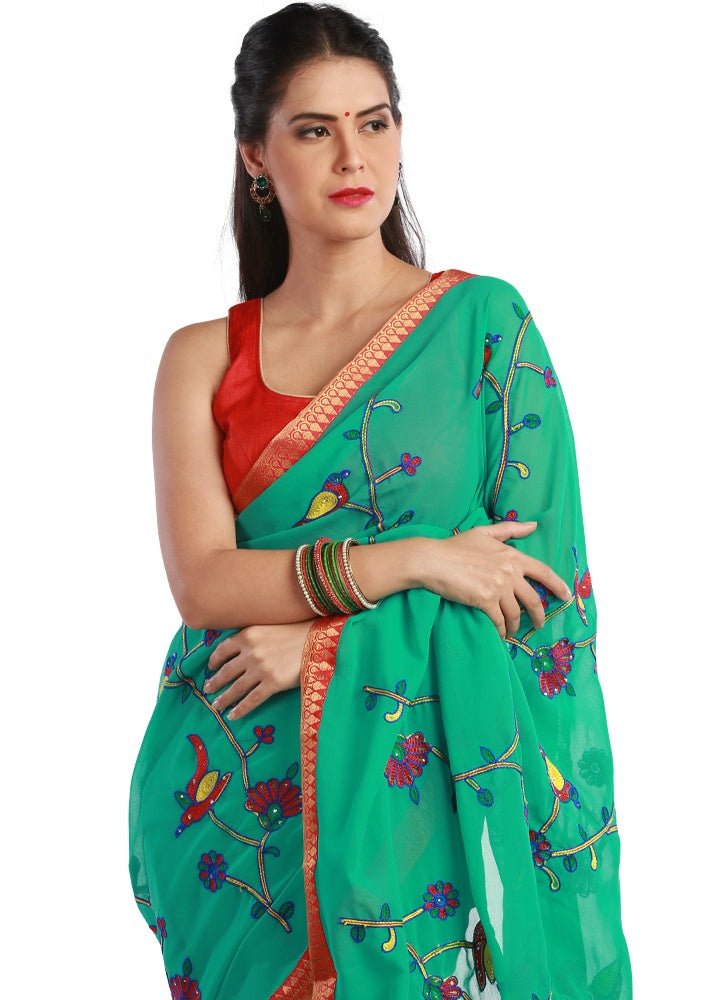 Teal Green Colored Georgette Embroidered Saree