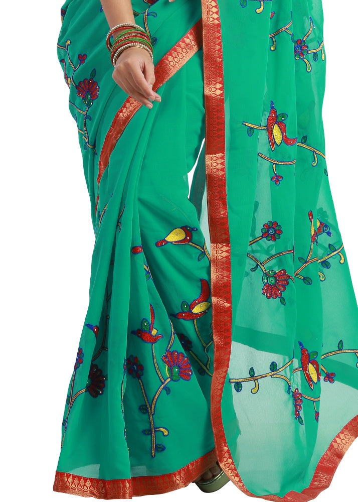 Teal Green Colored Georgette Embroidered Saree