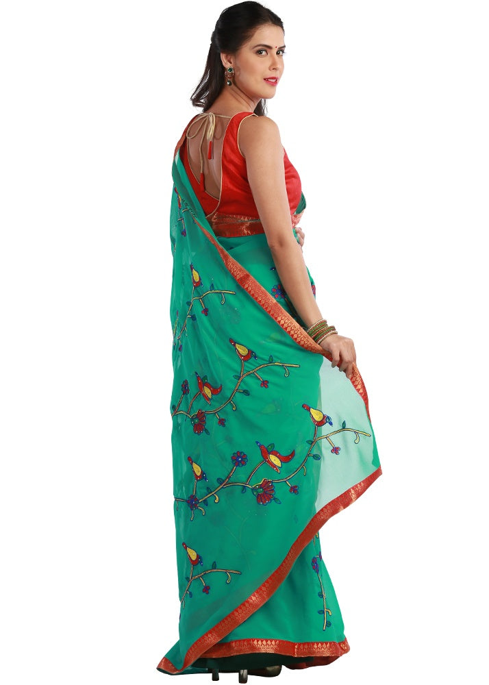 Teal Green Colored Georgette Embroidered Saree