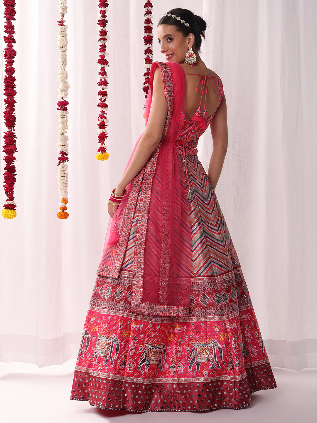Geometric Tribal Digital Print Lehenga Set with Tasseled Choli, Animal motifs and Belt