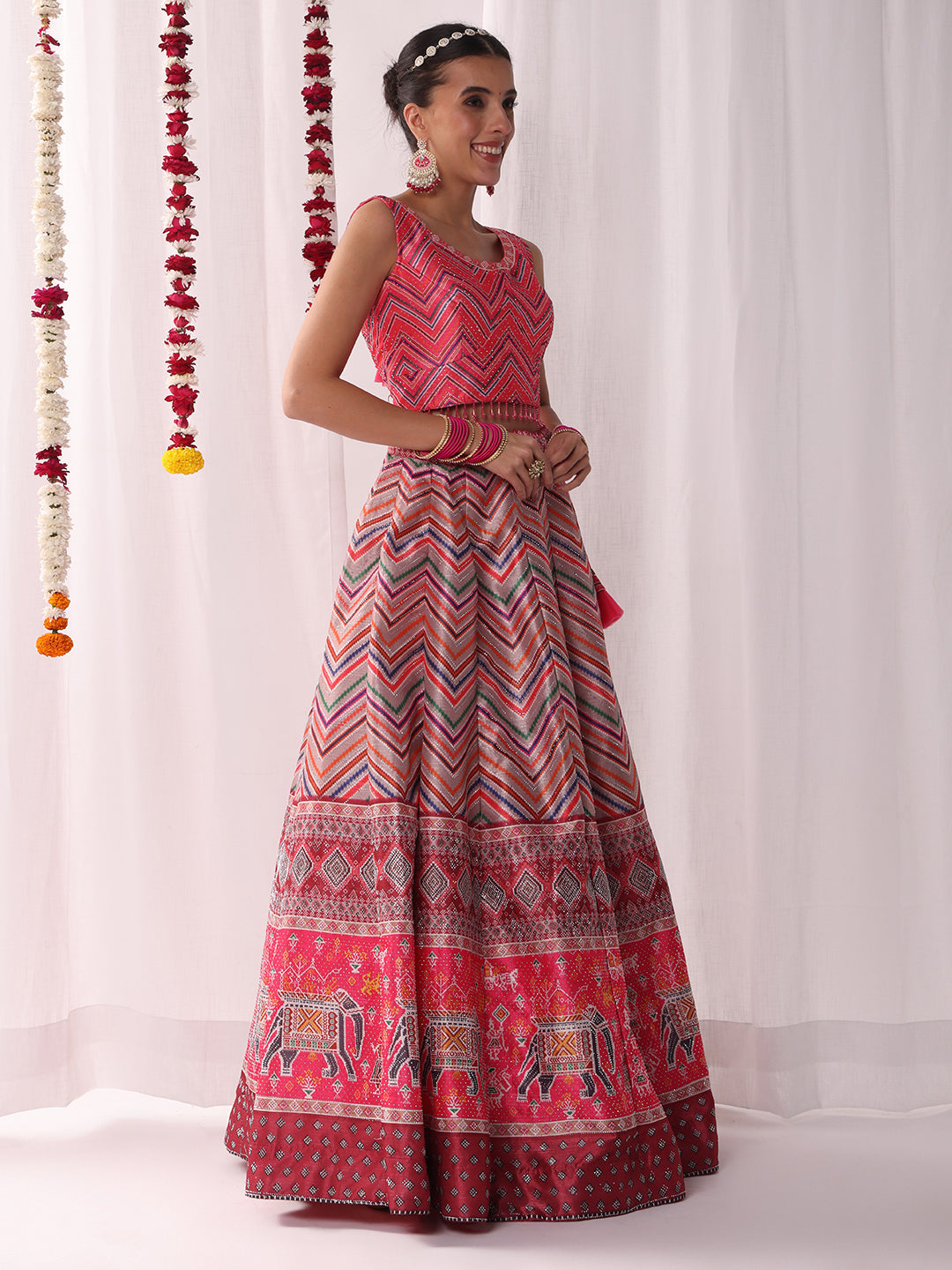 Geometric Tribal Digital Print Lehenga Set with Tasseled Choli, Animal motifs and Belt