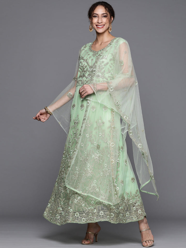 Pista Green Embroidered Floor Length Net Gown & Flared Sleeves