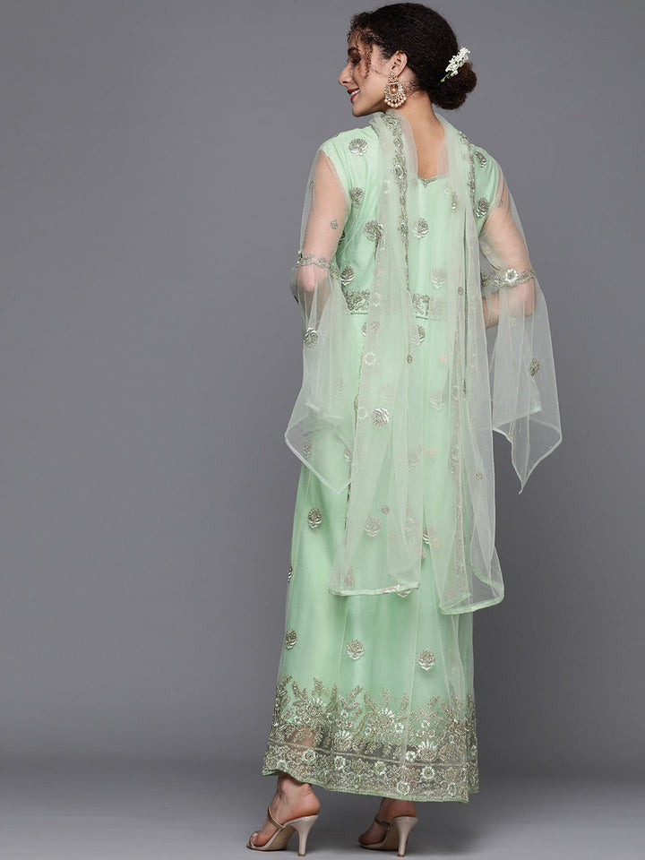 Pista Green Embroidered Floor Length Net Gown & Flared Sleeves