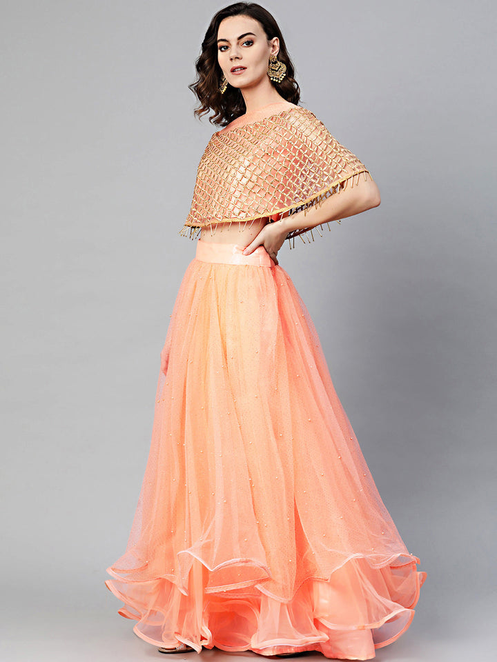 Cape Style Tassled Crop Top Blouse and foil print layered lehenga