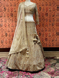 Ethereal Beige Tassel-Accented Bridal Lehenga