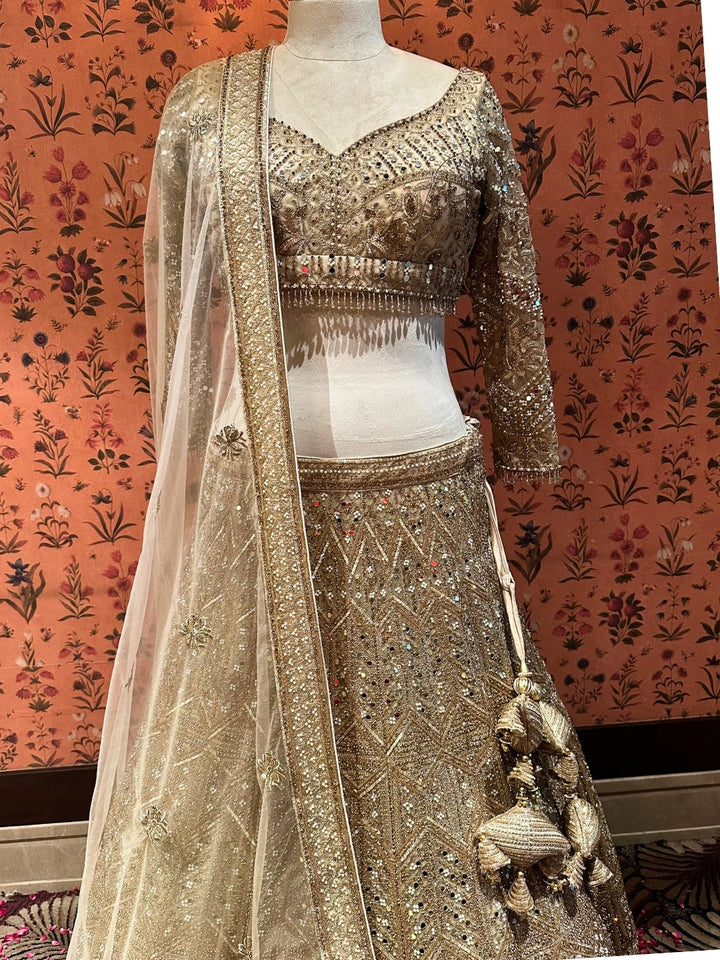 Ethereal Beige Tassel-Accented Bridal Lehenga