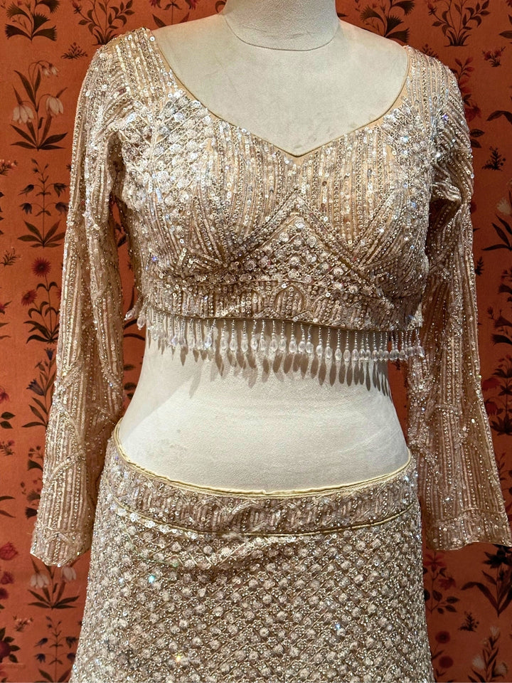 Ethereal Beige Tassel-Accented Bridal Lehenga