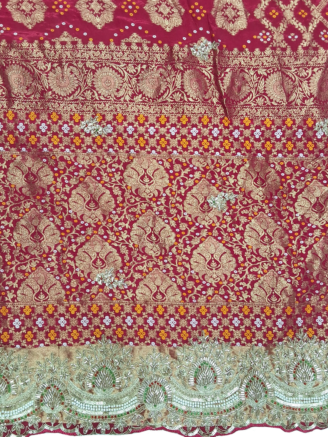 Rani Pink Bandhani Woven Silk Saree with Heavy Embroidered Border