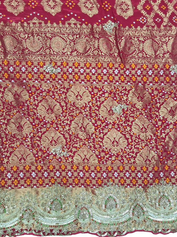 Rani Pink Bandhani Woven Silk Saree with Heavy Embroidered Border