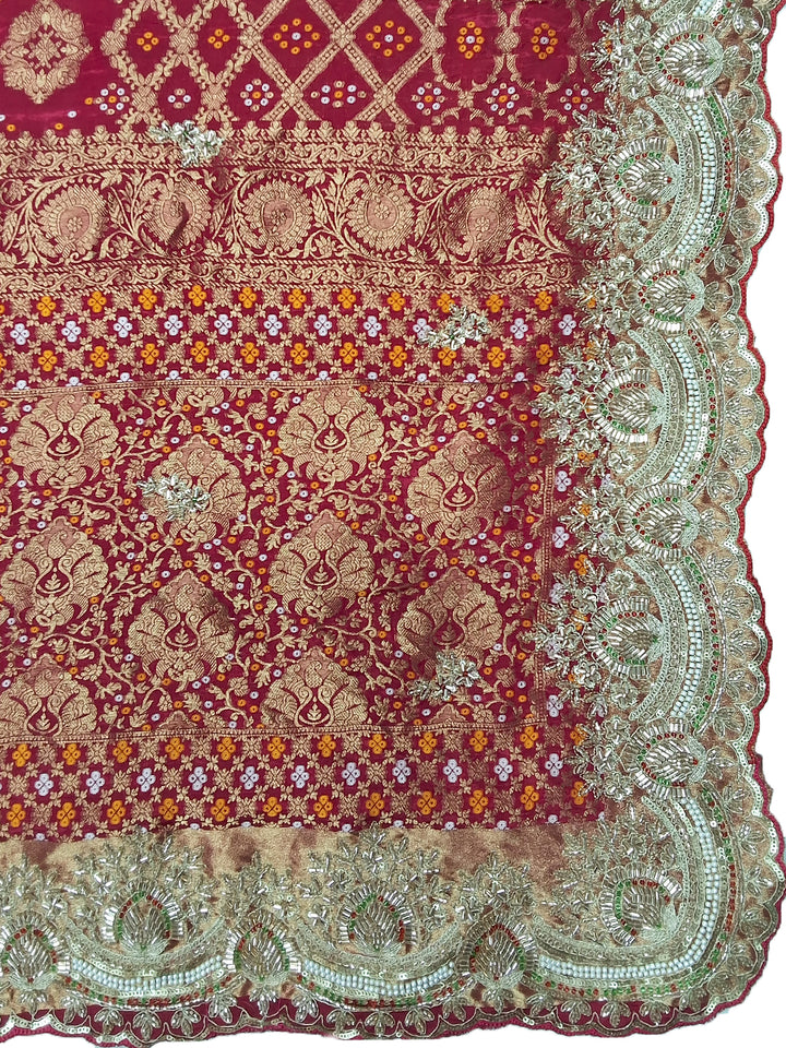 Rani Pink Bandhani Woven Silk Saree with Heavy Embroidered Border