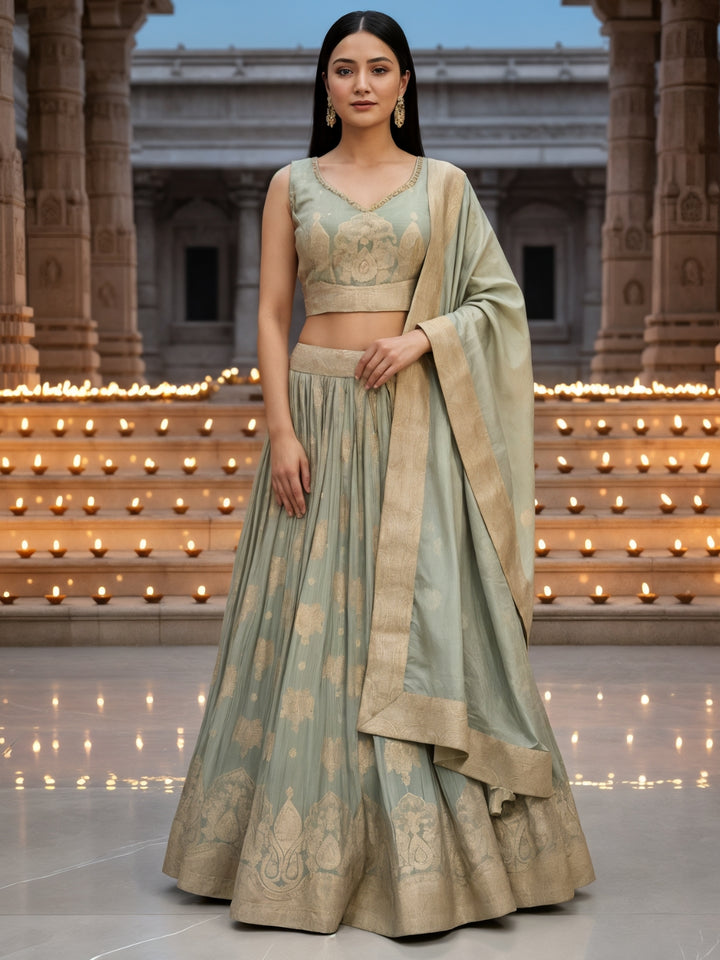 Pastel Green Banarasi Silk Lehenga Choli Set with Zari Woven Mughal Paisley Motifs
