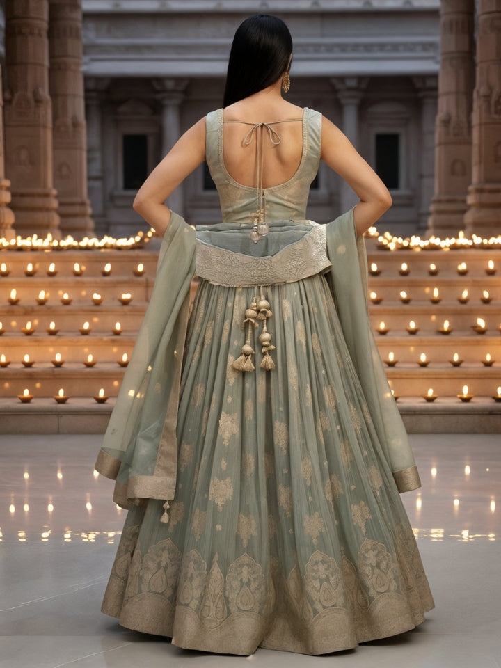 Pastel Green Banarasi Silk Lehenga Choli Set with Zari Woven Mughal Paisley Motifs